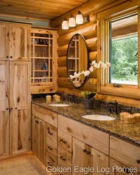 Kitchen in your wooden house with a window photo