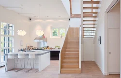 Living room kitchen design with stairs to 2nd floor