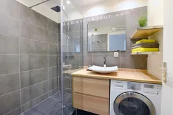 Bathroom design with bathtub and washing machine and sink