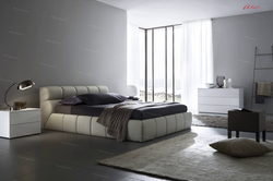 Modern bedroom design with large bed