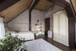 Bedroom design on the second floor of a wooden house