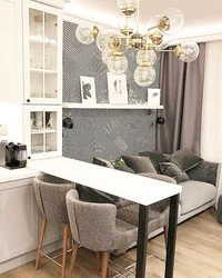 Kitchen design with sofa and dining table
