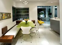 Kitchen design with sofa and dining table