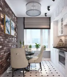 Kitchens with access to a balcony and a sofa photo
