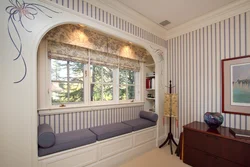 Apartment design with a window and a balcony in one room