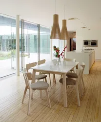 Kitchen With Wooden Table And Chairs In The Interior