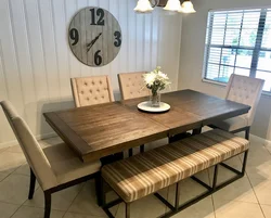 Kitchen with wooden table and chairs in the interior