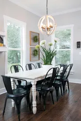 Kitchen with wooden table and chairs in the interior