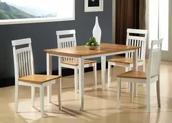 Kitchen with wooden table and chairs in the interior