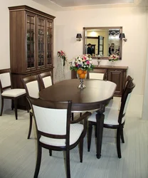 Kitchen with wooden table and chairs in the interior