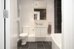 Bathroom design dark tiles and light