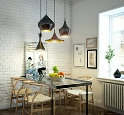 Panel in the kitchen photo above the dining table