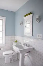 Tiles in the bathroom on half the wall photo