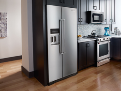 Two refrigerators in the kitchen photo