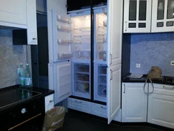 Two refrigerators in the kitchen photo