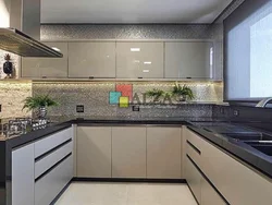 Gray kitchen with black countertop photo