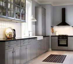 Gray kitchen with black countertop photo
