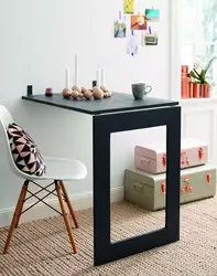 Table attached to the wall in the kitchen photo