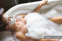 Photo in a bathtub with foam