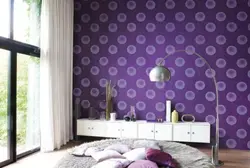 Photo of a wallpapered bedroom