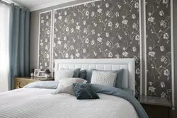 Photo of a wallpapered bedroom