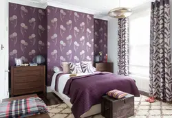 Photo of a wallpapered bedroom