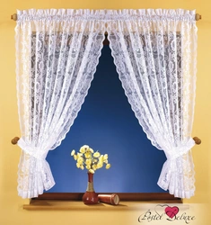 Curtains for the kitchen short made of tulle with an arch photo