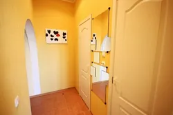 Yellow wallpaper in the hallway interior