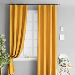 Mustard curtains in the kitchen interior