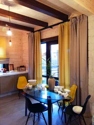 Mustard curtains in the kitchen interior