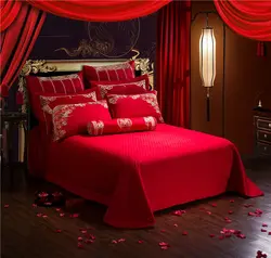 Red curtains in the bedroom interior