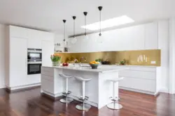Kitchen design with gold handles