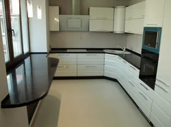 Corner kitchens with window sill countertop photo