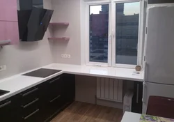 Corner kitchens with window sill countertop photo