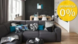 Sofas in the interior of a narrow living room