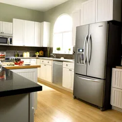 Light Refrigerator In The Kitchen Interior