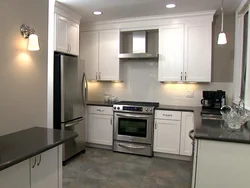 Light refrigerator in the kitchen interior