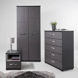 Wardrobe chest of drawers for linen and clothes in the bedroom photo
