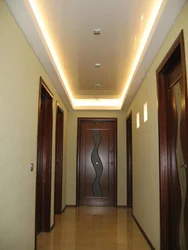 Hallway with brown ceiling photo