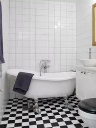 Square tiles in the bathroom interior