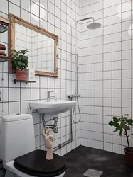 Square tiles in the bathroom interior