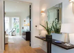 2 mirrors in the hallway photo