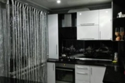 Black tulle in the kitchen interior