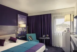 Purple curtains in the bedroom interior