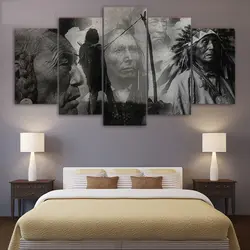 Posters in the bedroom interior above the bed