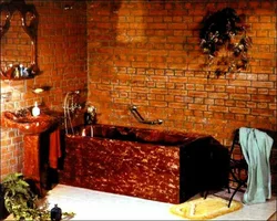 Do-it-yourself bathtub made of bricks and tiles photo