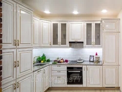 Classic white kitchen with gold patina photo