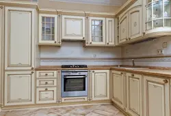 Classic white kitchen with gold patina photo