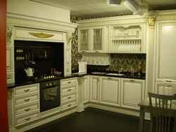 Classic white kitchen with gold patina photo