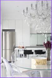 Chandeliers In The Interior Of A White Kitchen